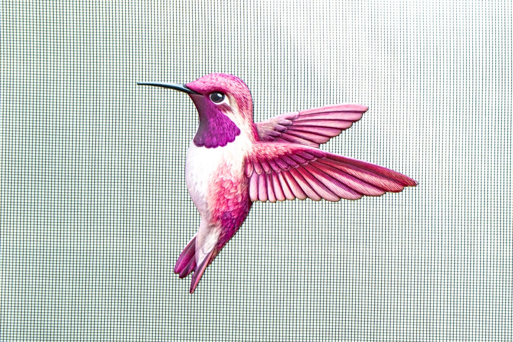 ScreenSense Pink Hummingbird screen door magnet installed on screen mesh
