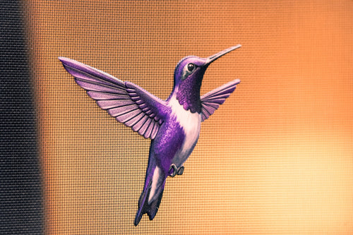 ScreenSense Purple Hummingbird magnet installed on screen mesh